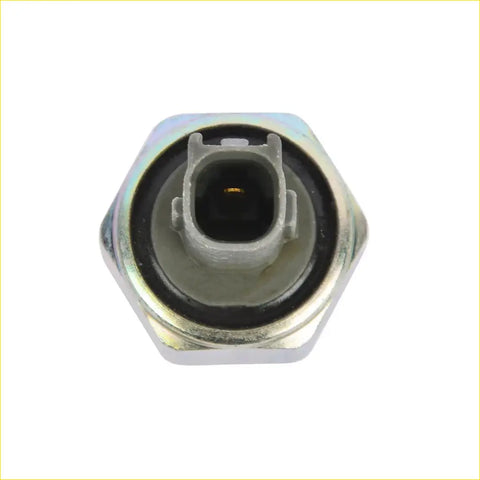 Silver hexagonal knock sensor with gray plastic connector housing for toyota land cruiser 45l 1993 to 1997