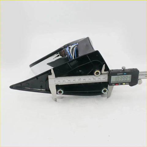 Black and chrome motorcycle headlight assembly showing internal wiring paired with led chrome door mirror for toyota hilux 4wd 1997-2005