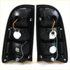 Black plastic led smoke lens tail light assemblies with wiring and mounts for toyota hilux 2004-2016 back side view