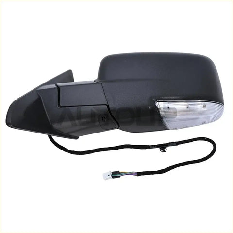 Black plastic left side view mirror for ram 1500 with power fold turn signal and temp sensor showing back side