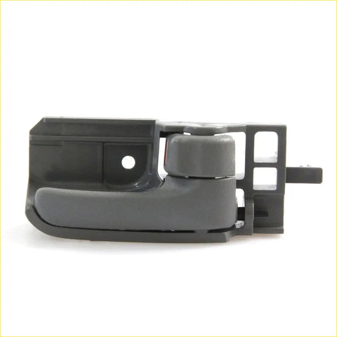 Black plastic car door handle with textured grip and latch for light gray door handle bezel toyota hilux sr5 2004-2016