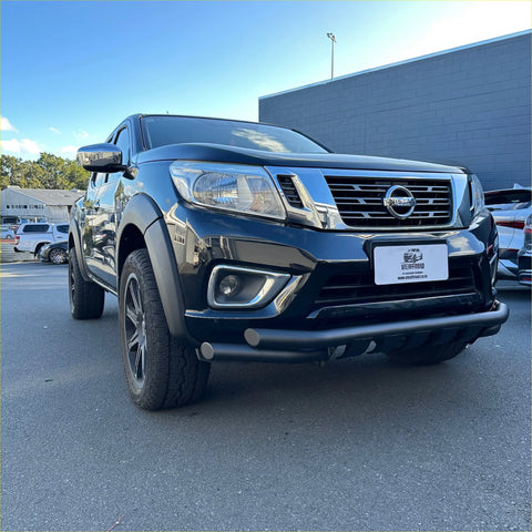 Black nissan navara pickup with low bar nudge bar rugged front bumper and alloy wheels 2015-2025 model