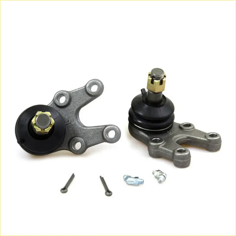 Gray metal lower ball joints with black rubber boots and brass inserts for Datsun Junior 140 1970-1984 with bolts
