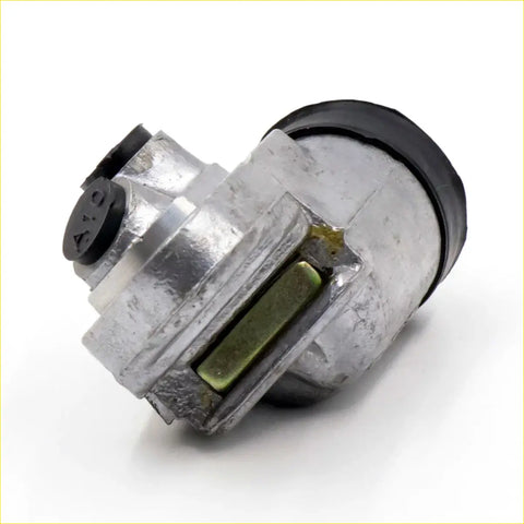 Silver metal lower lh wheel brake cylinder with black rubber seals and green part for datsun nissan 520 521 620 720
