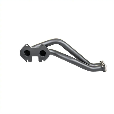 Black metal exhaust manifold with two circular inlets and curved design for mazda rx7 12a extractor gasket mag701