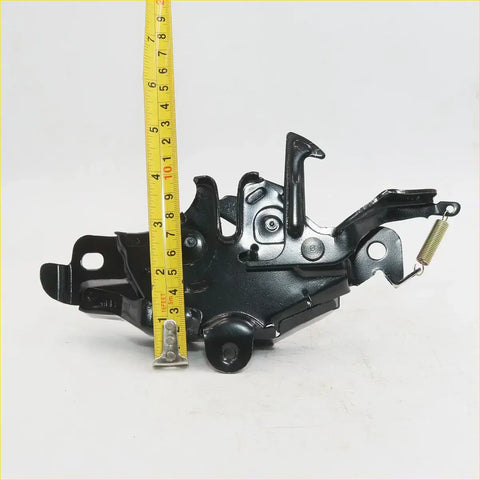 Black painted metal car door latch mechanism with spring and brackets for toyota hilux 1997-2005 back side view