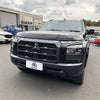 Black mitsubishi triton 2024 with monsoon bonnet guard featuring bold grille and sleek headlights for aftermarket style