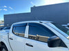 White pickup truck with black window visors featuring monsoon and bonnet guard for mitsubishi triton 2005-2015