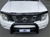 White nissan frontier with black front bumper guard and grille featuring monsoon and bonnet guard for navara d40