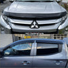Silver mitsubishi triton pickup with black front bumper guard and side window visors monsoon bonnet guard oem style 2019-2023