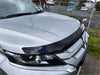 Silver mitsubishi triton suv with a black monsoon bonnet guard and front bumper protector 2019-2023 model