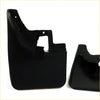 Black plastic mud flaps with molded contours and mounting holes for Nissan Navara D22 1997-2005 shown from back side