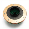 Mushroom air filter with gold circular air intake, black inner parts, green mesh, and silver screws on the back side