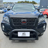 Black nissan np300 pickup with rugged front bumper guard featuring nismo grille for 2021+ navara model