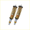 Gold-colored coilover suspension shocks with black and silver parts for nissan navara frontier d40 dobinsons ims monotube