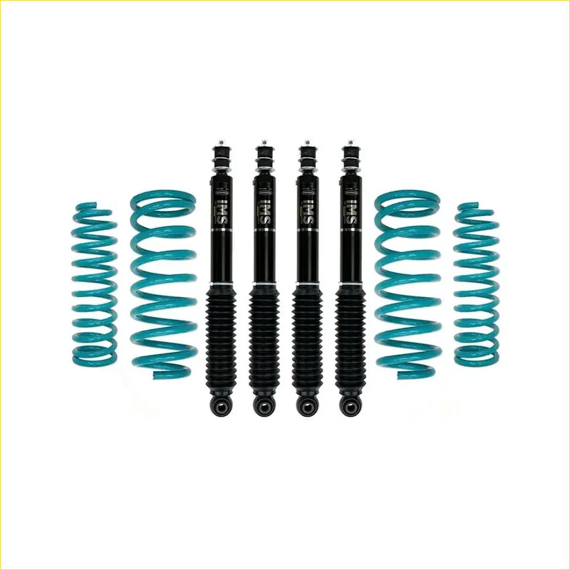 Set of four black dobinsons ims monotube shock absorbers with teal coil springs for nissan patrol y60 gq ute 1992 to 1999