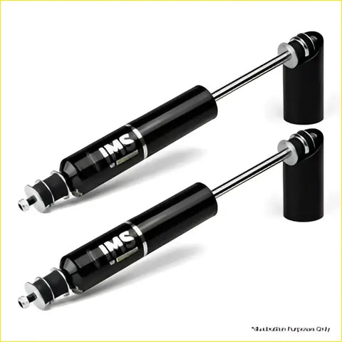 Black ims shock absorbers with chrome accents and sleek cylindrical design for Nissan Patrol Y60 GQ and Y61 GU models