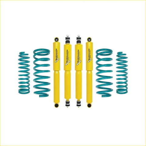 Set of four bright yellow dobinsons twin tube nitro gas shock absorbers with teal springs for nissan patrol y61 gu ute