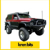 Red and black two-tone lifted nissan safari GQ Y60 monsoon SWB with rugged tires roof rack and bold front bumper