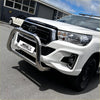 Shiny chrome nudge bar with front sensor compatibility mounted on white toyota hilux 2015-2025 model