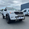 White toyota hilux with black fender flares and chrome nudge bar compatible with front sensors 2005-2015