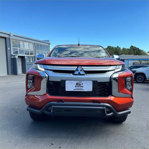 Red mitsubishi triton pickup with black nudge bar lower style and chrome grille for 2019-2023 models
