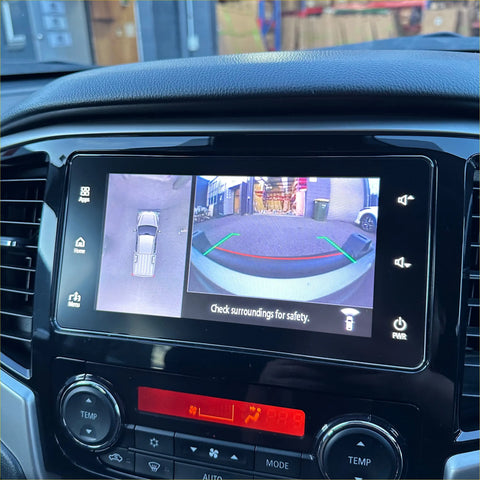 Black nudge bar lower style for mitsubishi triton 2019-2023 shown from back with split-screen rearview camera display