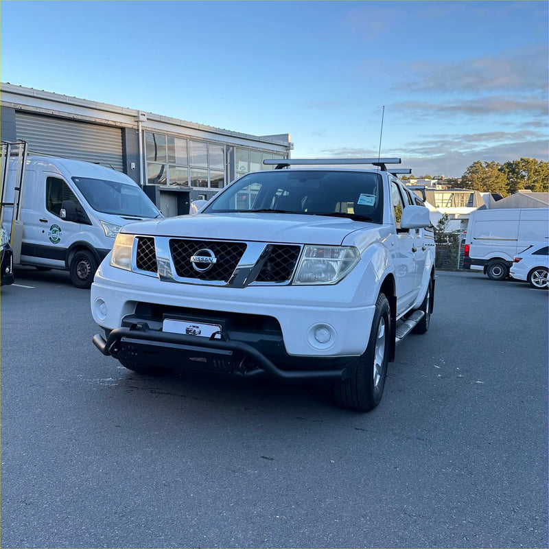 White nissan frontier pickup with black nudge bar lower style bumper guard and roof rack for navara d40 2005-2015