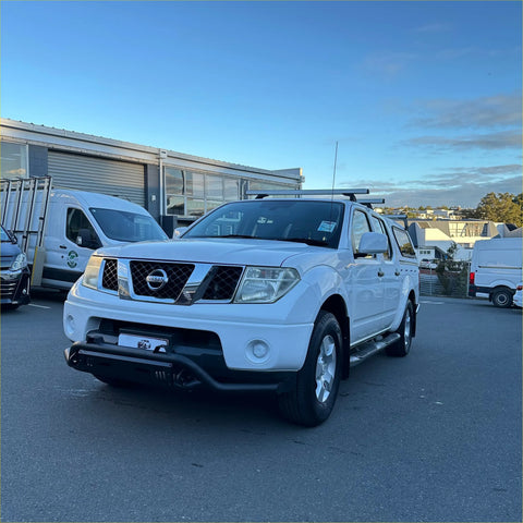 White nissan navara d40 with black metal nudge bar lower style bumper and side steps for 2005-2015 thai model