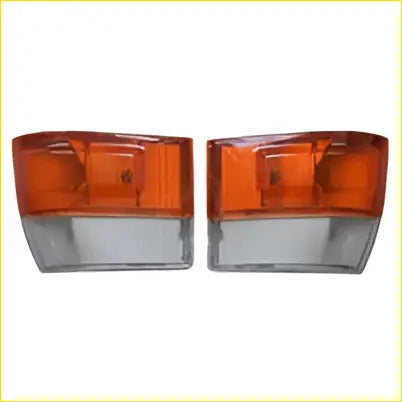 Pair front corner indicator lights in orange and clear plastic with curved rectangular design for toyota hiace van 1989-2005