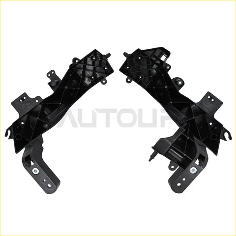 Black plastic automotive front bumper cover trim pieces with molded contours and mounting holes for jeep grand cherokee