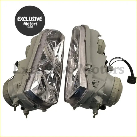 Pair of gray plastic and metal led headlights with clear multifaceted lenses for toyota chaser gx100 jzx100 1996-1999