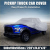 A sleek gray pickup truck car cover with smooth draping fabric designed for toyota tacoma crew cab 2005-2021