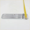 Chrome-finished metal foot pedal with sleek rectangular design and grooves shown with polished chrome dodge ram mirror
