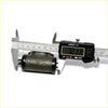 Black and silver digital caliper measuring dark gray textured rear brake cylinder for mitsubishi galant sigma 1983-1988