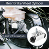 Silver metallic rear brake wheel cylinder with black rubber boot and threaded fittings for toyota hilux 2010-2015 close-up back view