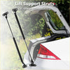 Black metal lift support struts installed on a white toyota land cruiser trunk for rear hatch lift support