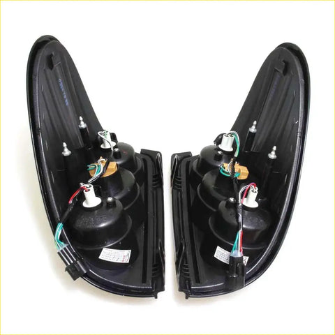 Black plastic rear led tail lights smoke black with wiring and bulb sockets for mitsubishi l200 triton ml mn back view