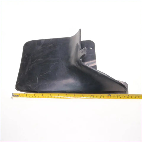 Black rubber rear mud flap for Nissan Navara D22 1997-2004 with curved edge and side mounting bracket shown from back