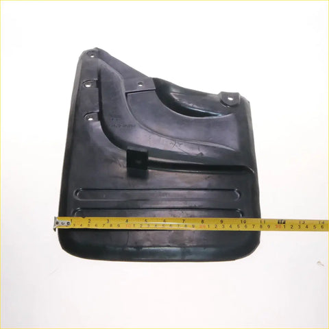 Black rubber rear mudguard with molded contours and mounting holes for toyota hilux 4x4 2004-2010 back side