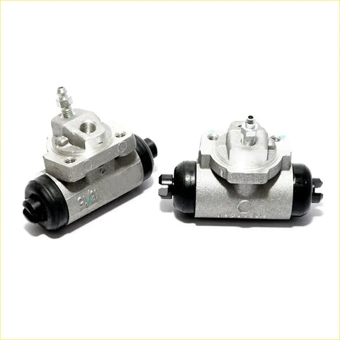 Rear wheel brake cylinder 2.0l for nissan rnessa n30 1997-2000 showing silver metallic drum brake assemblies with black rubber parts