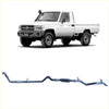 White toyota land cruiser pickup with black roof rack and rugged tires featuring redback extreme duty exhaust system