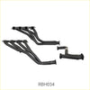 Black metal exhaust manifold set with sleek angular design and polished finish for redback performance holden calais