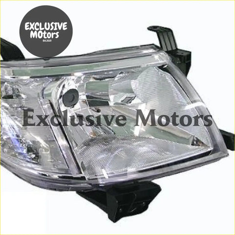 Right hand clear plastic headlight for toyota hilux 2011-2015 with black mounting brackets visible