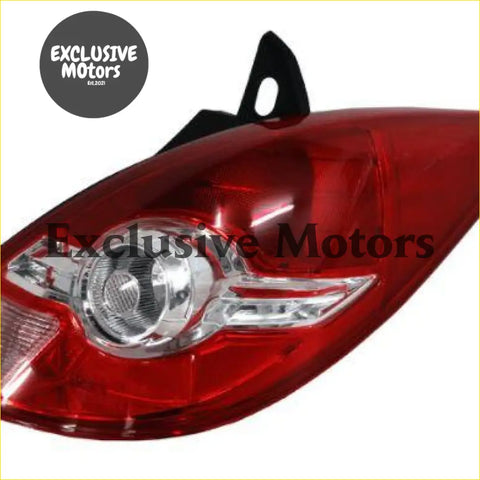 Right-hand tail light for nissan tiida hatch 2008-2012 red plastic with clear lens and chrome trim shown from back side