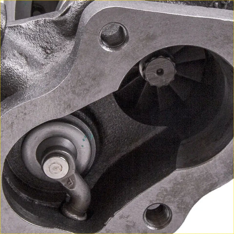 Gray metallic right turbine for mitsubishi gt3000 3.0 v6 with machined surfaces and internal parts shown from back side