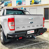 Silver ford ranger ute with black rockarmor steel rear step towbar and red branding for offroad 4wd use