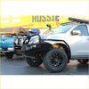 Black metal Rockarmor brushbar front bumper guard with integrated lights and rock logo for Isuzu Dmax 4wd ute offroad