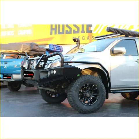 Black metal Rockarmor brushbar front bumper guard with integrated lights and rock logo for Isuzu Dmax 4wd ute offroad