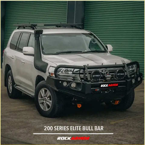 Black rockarmor elite bullbar 4wd frontal combo on white toyota land cruiser 200 series ute offroad gear